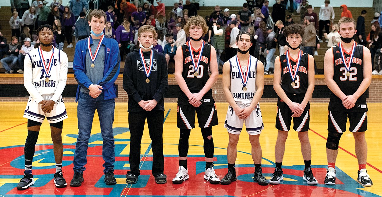 Five of the eight players from the boys' side of the Carlinville Holiday Tournament were from Montgomery County this year as the team was announced at the conclusion of the final game on Thursday, Dec. 30. From the left are Litchfield's Keenan Powell, Carlinville's Aaron Wills, Bunker Hill's Grant Burch, Hillsboro's Drake Vogel, Litchfield's Victor McGill, and Hillsboro's Will Christian and Gavin Matoush. Not present for the photo was East Alton-Wood River's Antonio Hardin.